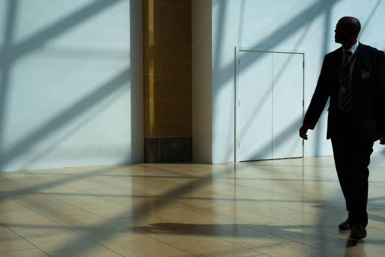 An officer walking through a building interior